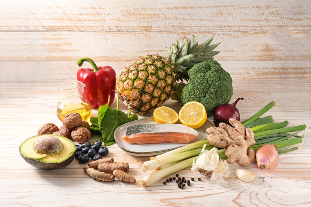 Anti-inflammatory foods such as pineapple, lemons, healthy fats, ginger, onions, garlic, turmeric, blueberries, etc.